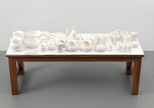 STILL LIFE, 2009, MARBLE, WOOD TABLE, 120 × 213.4 × 76.2 CM, COURTESY THE ARTIST AND HAUSER &amp; WIRTH, PHOTO: STEFAN ALTENBURGER PHOTOGRAPHY ZURICH, © SUBODH GUPTA